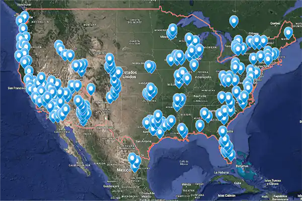 Map of the United States with numerous blue location markers spread across various states, highlighting specific points of interest. Ideal for incorporating into a website's CTA to guide users or enhance SEO by pinpointing relevant geographical data.